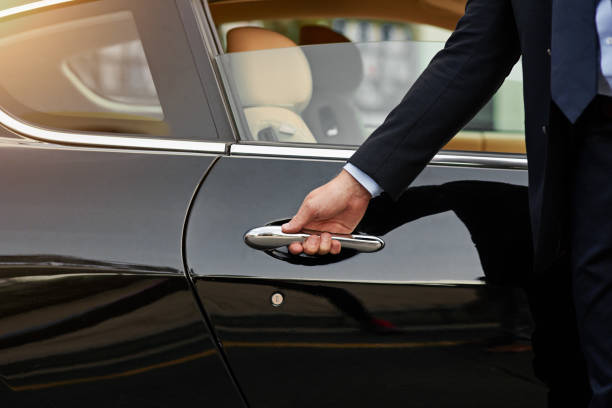 Chauffeur in luxury vehicle